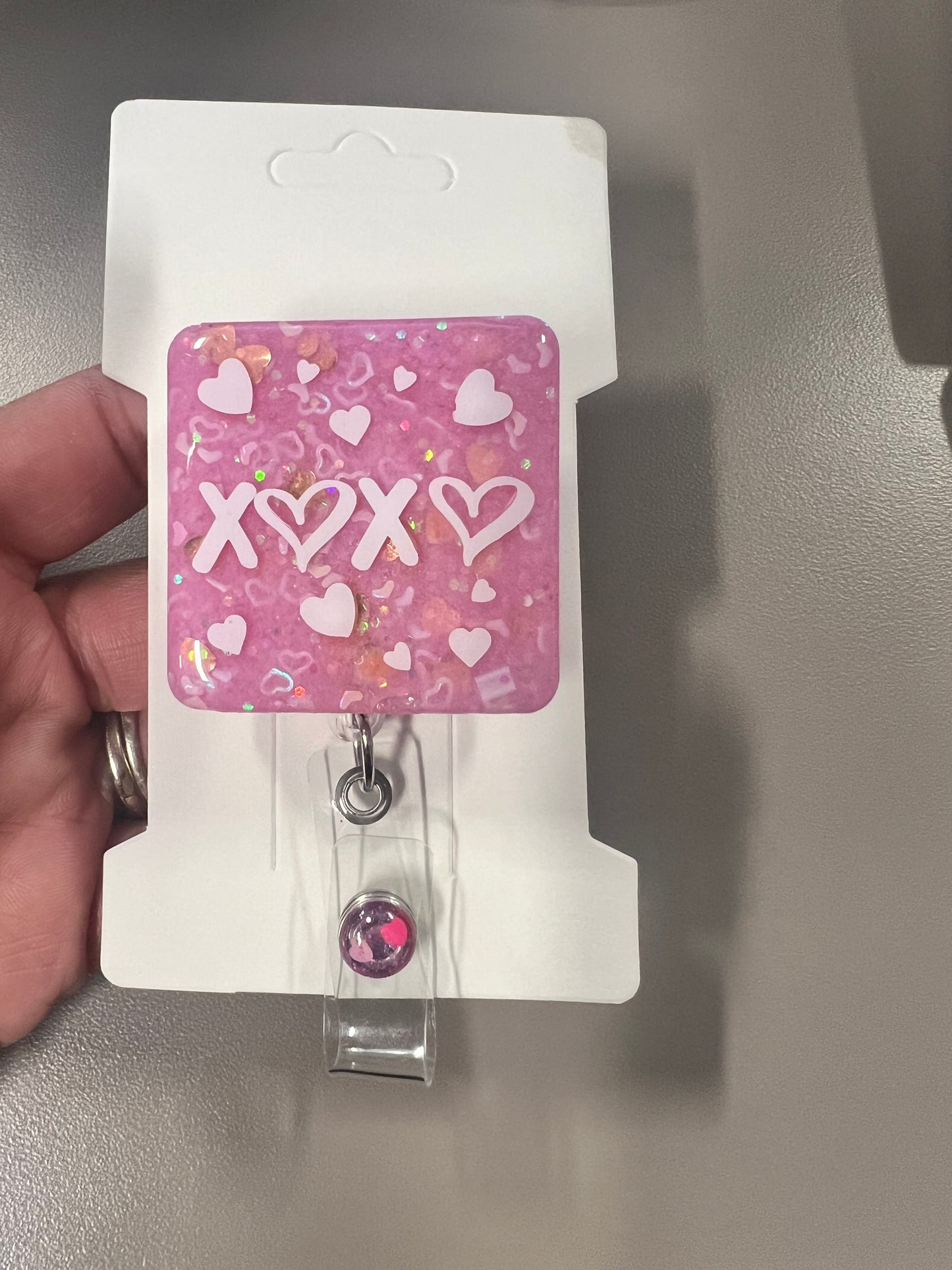 Pink XOXO Badge Reel